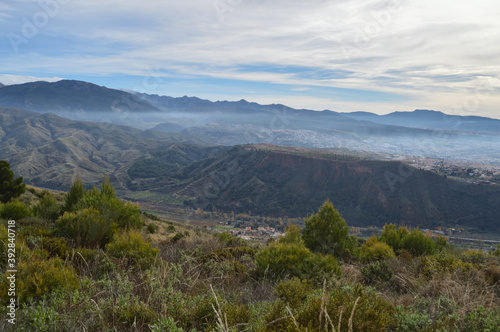 Sierra Nevada and Villages seen from Dehesa del Generalife in Granada, Spain © MilesAstray