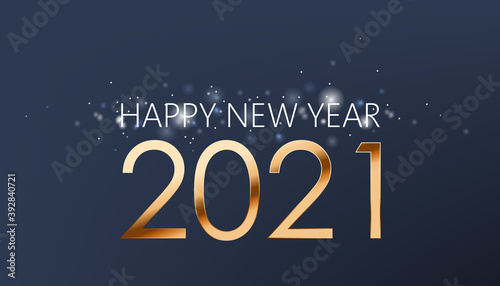 New year composition of golden numbers and silver sparkles on dark blue backg...