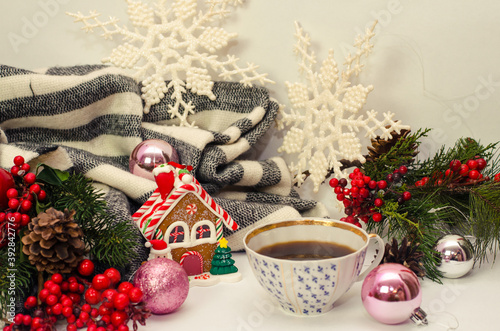 Christmas still Life with a Christmas house and a Cup of coffeе