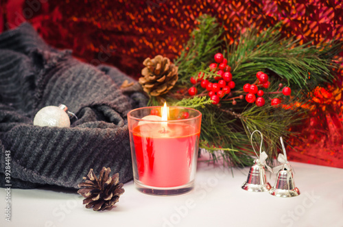 Christmas still life with candle and christmas decorations