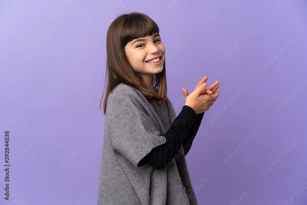 Little girl over isolated background applauding Little girl over isolated background applauding