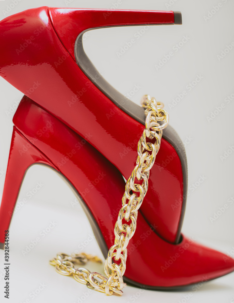 Obraz premium red shoes on a white background