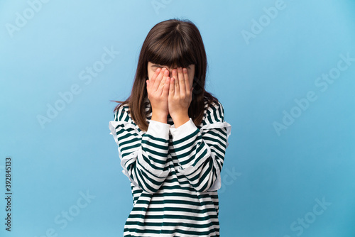 Little girl over isolated background with tired and sick expression