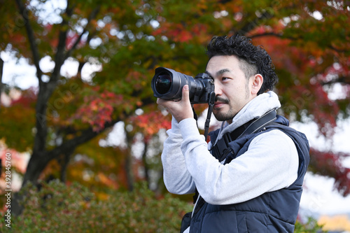 日本人のカメラマンコピースペース付き