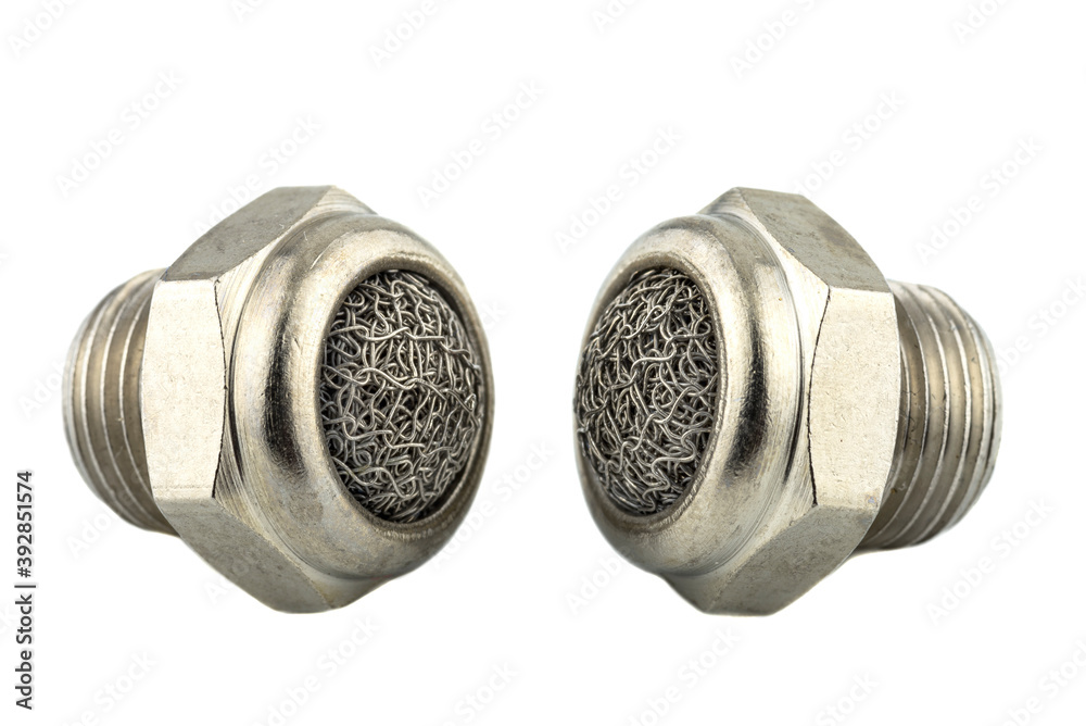 Macro shots of two steel air silencers with a metal mesh inside, isolated on a white background. Macro shots of two steel air silencers with a metal mesh inside, isolated on a white background.