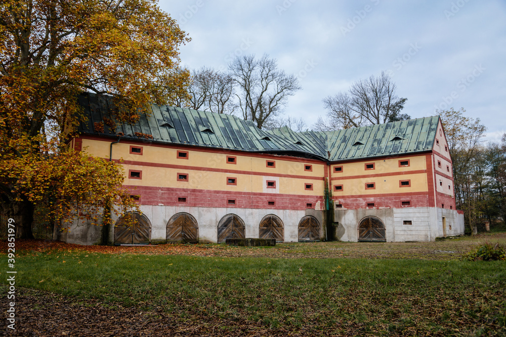 Old abandoned ruined baroque Libechov castle in sunny autumn day, Romantic chateau was heavily damaged after affected by flooding in 2002, Central Bohemia, Czech republic