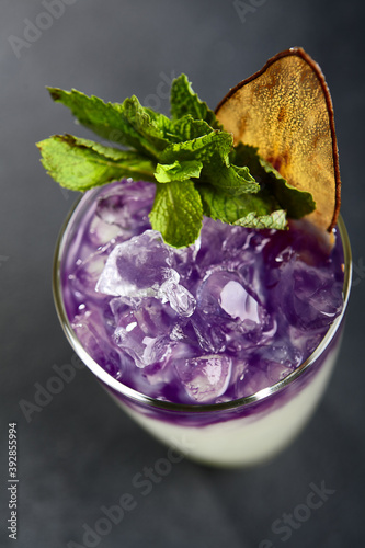 Modern cocktail with pear and ube  sweet potato photo