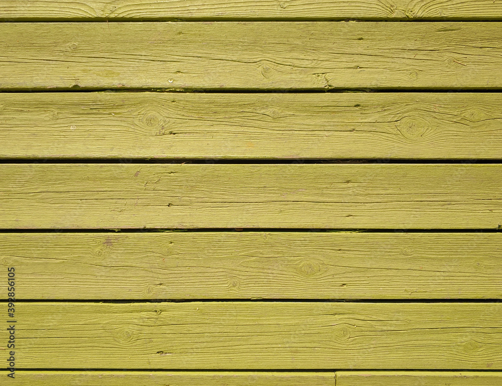 pale yellow green painted wood planks top view closeup, space for your text pale yellow green painted wood planks top view closeup, space for your text