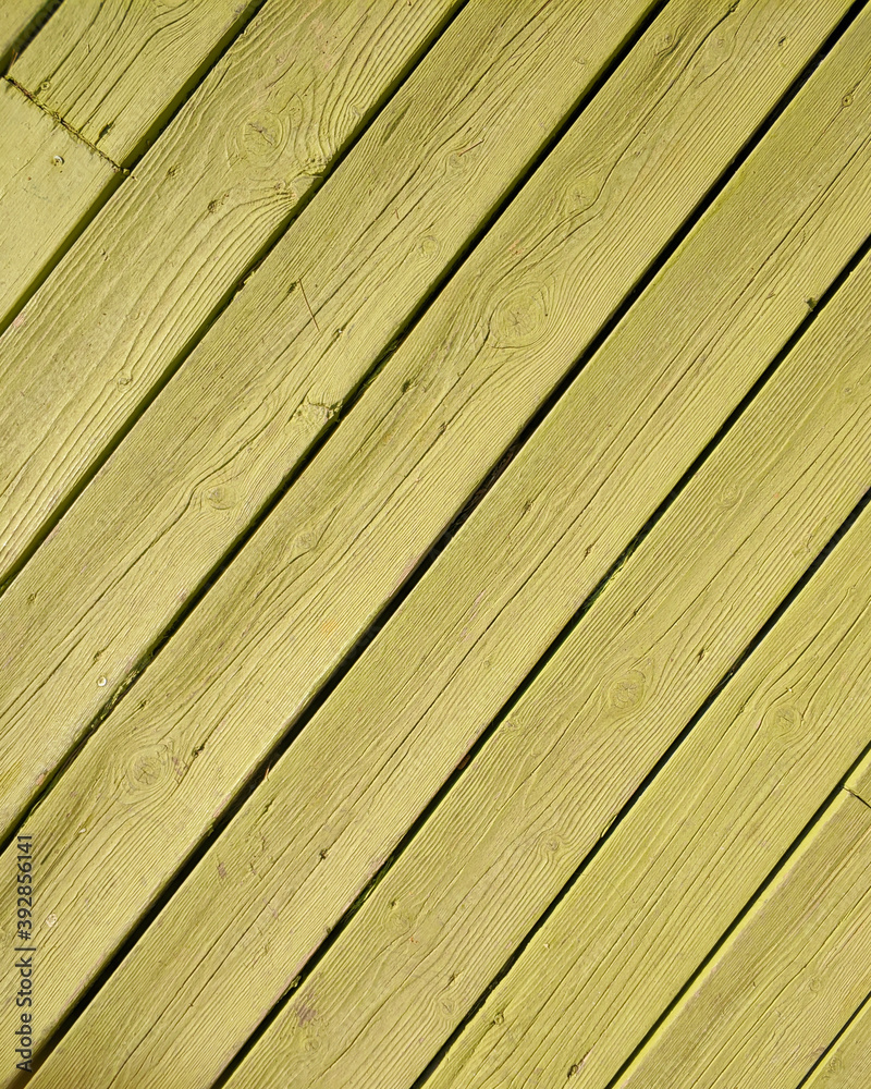 pale yellow green painted wood planks top view closeup, space for your text pale yellow green painted wood planks top view closeup, space for your text