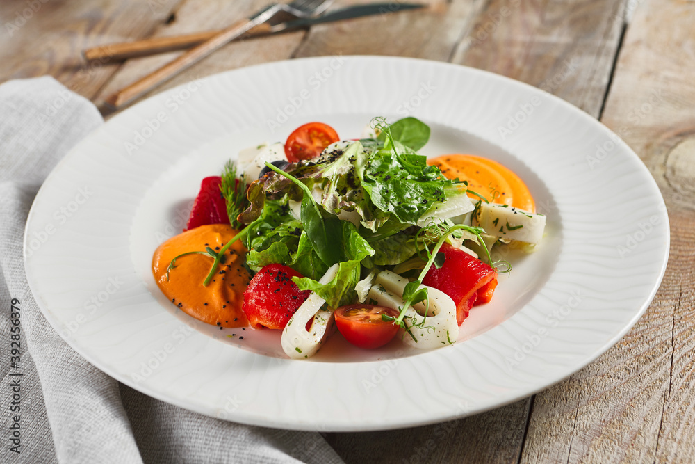 Roasted pepper salad with calamari and fresh greens Roasted pepper salad with calamari and fresh greens