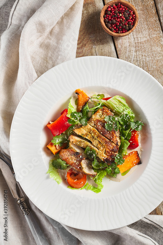 Chicken fillet with baked vegetable salad