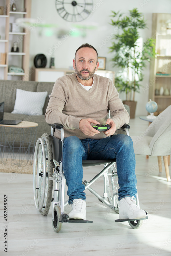 disabled man playing computer games disabled man playing computer games