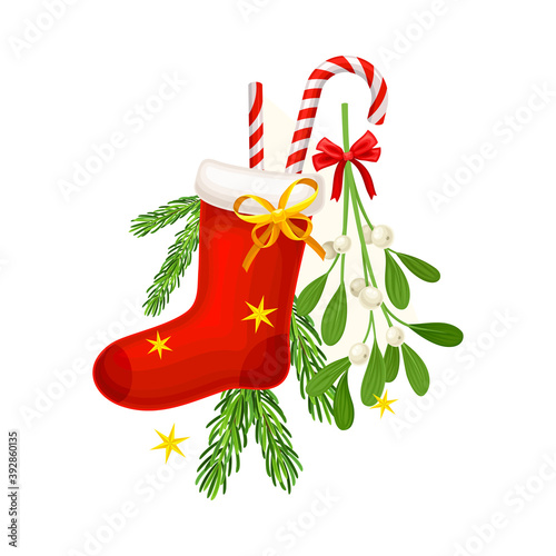 Red Stocking with Candy Sticks and Fir Branch as Christmas Vector Composition