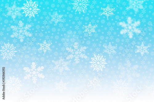 Light blue background with white snowflakes. Greeting card  wallpaper