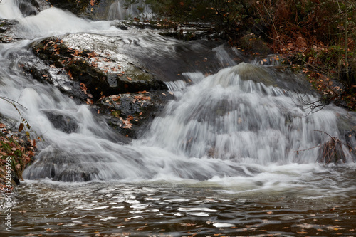 Small waterfalls in the bed of the Sestil de Ma  llo stream. Autumn in the Sierra de Guadarrama National Park. Madrid s community. Spain