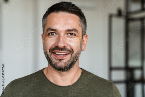 Successful businessman standing in office