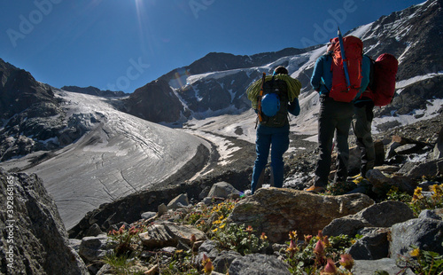 mountaineers scouting their rout on the glacier in Taschachferner, Alps, Austria
