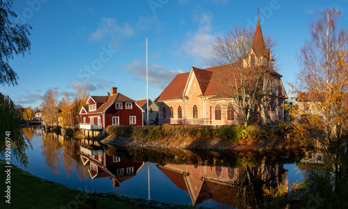 Old tow of Falun with traditional, picturesque, red wooden houses in the city of Falun in Dalarna, Sweded photo