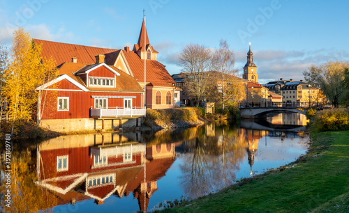 Old tow of Falun with traditional, picturesque, red wooden houses in the city of Falun in Dalarna, Sweded photo