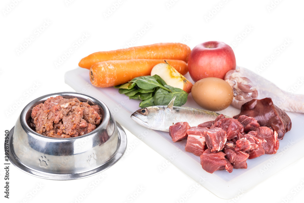 Minced barf raw food recipe ingredients for dogs consisting meat, organs, fish, eggs and vegetable