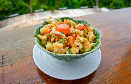 rice with Tempura shrimp and raw egg on top