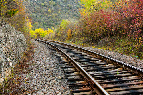 Russian Straight Railway with trees. Landscape with railroad, summer time traveling, freedom of movement.