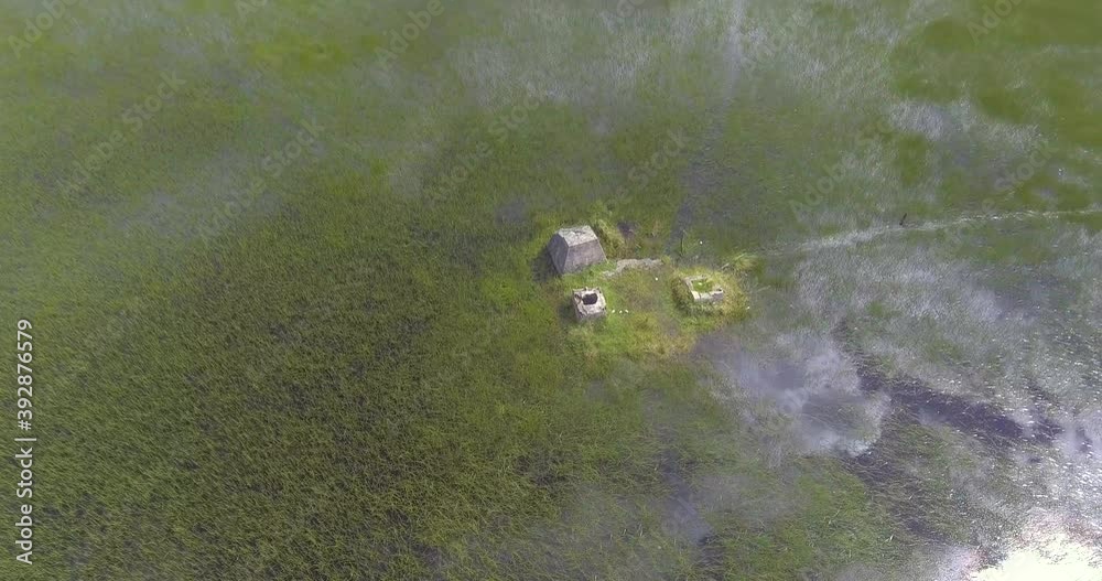 Ancient Archeological Ruins on Small Island in the Middle of Semi Dry Seasonal Lagoon shot from Above Ancient Archeological Ruins on Small Island in the Middle of Semi Dry Seasonal Lagoon shot from Above