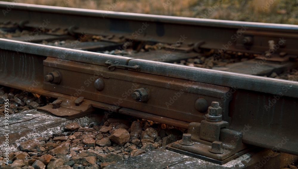 Rail rails on sleepers with bolts and nuts