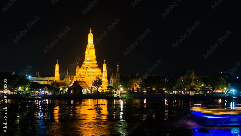 time lapse of Wat Arun Temple with Chao Phraya river at night in Bangkok, Thailand time lapse of Wat Arun Temple with Chao Phraya river at night in Bangkok, Thailand