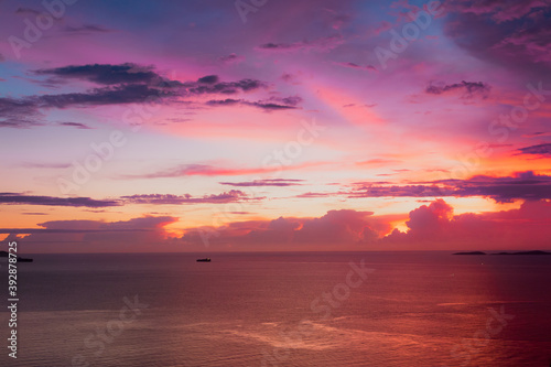 View from Koh Larn island overlooking the Gulf of Thailand during sunset time with a beautiful colorful sky.