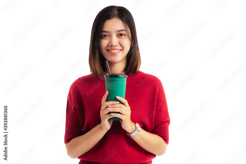 Happy smiling, beautiful Asian girl holding a green paper coffee cup standing isolated on a white background, clipping path Happy smiling, beautiful Asian girl holding a green paper coffee cup standing isolated on a white background, clipping path