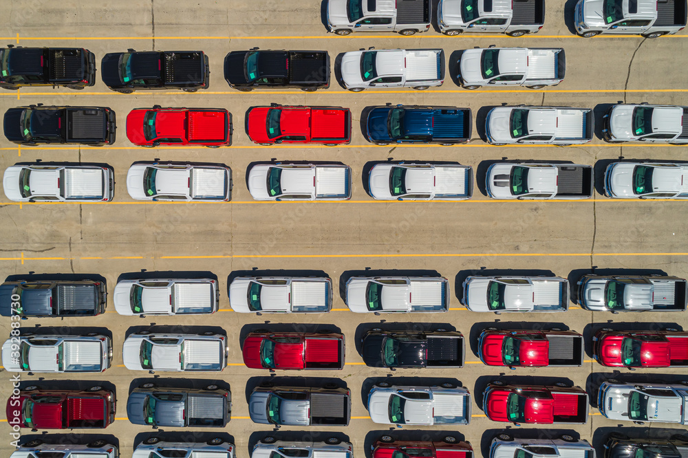 Overhead Aerial Shot of Large Vehicle Stock Lot at an Automobile Manufacturing Assembly Plant. Overhead Aerial Shot of Large Vehicle Stock Lot at an Automobile Manufacturing Assembly Plant.