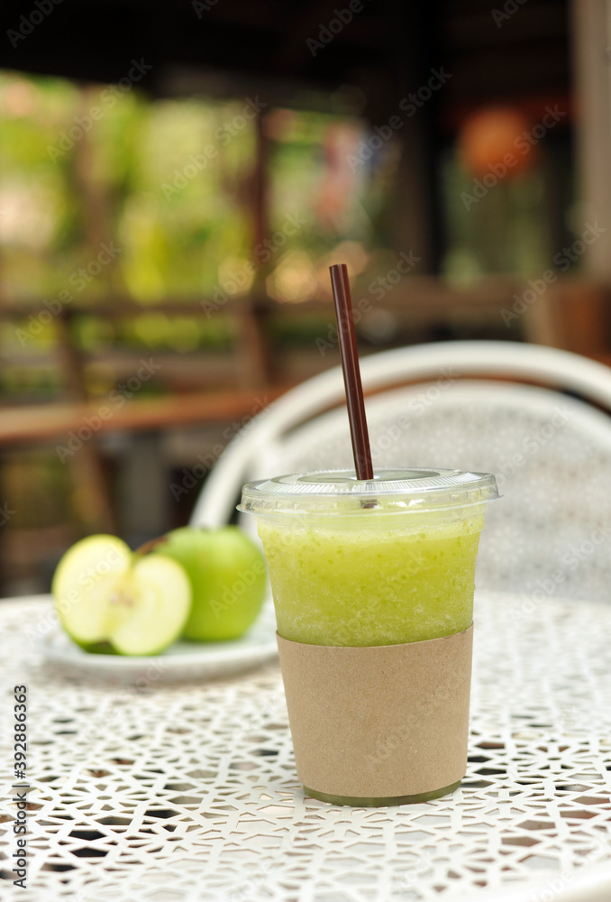 Fresh healthy green vegetables and green fruit smoothie on rustic wood table. - Image Fresh healthy green vegetables and green fruit smoothie on rustic wood table. - Image