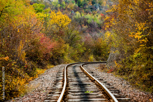 Russian Straight Railway with trees. Landscape with railroad, summer time traveling, freedom of movement.