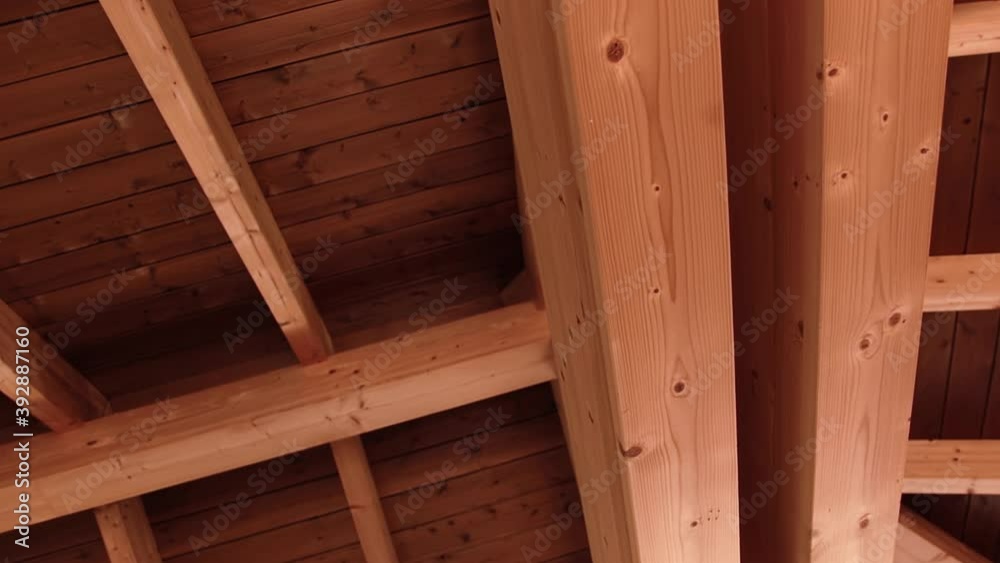 a wooden ceiling of natural boards and beams a wooden ceiling of natural boards and beams