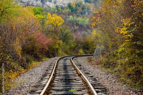 Russian Straight Railway with trees. Landscape with railroad, summer time traveling, freedom of movement.