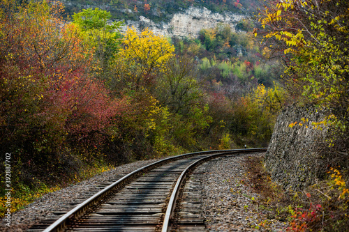 Russian Straight Railway with trees. Landscape with railroad, summer time traveling, freedom of movement.