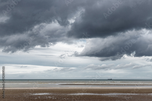 Oostduinkerke  Belgium - Octobr 23  2020  Nice view of the North Sea beach under heavy clouds