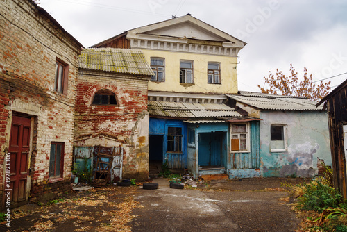 The yard of the old house. Autumn in the city. The picture was taken in Russia, in Orenburg