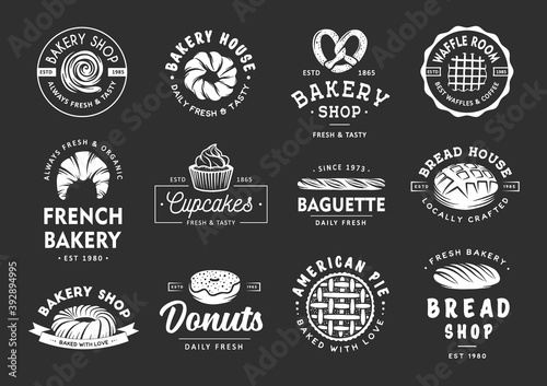 Set of vintage style bakery shop labels, badges, emblems and logo. Vector illustration. White graphic art with engraved design elements. Collection of linear graphic on black background.