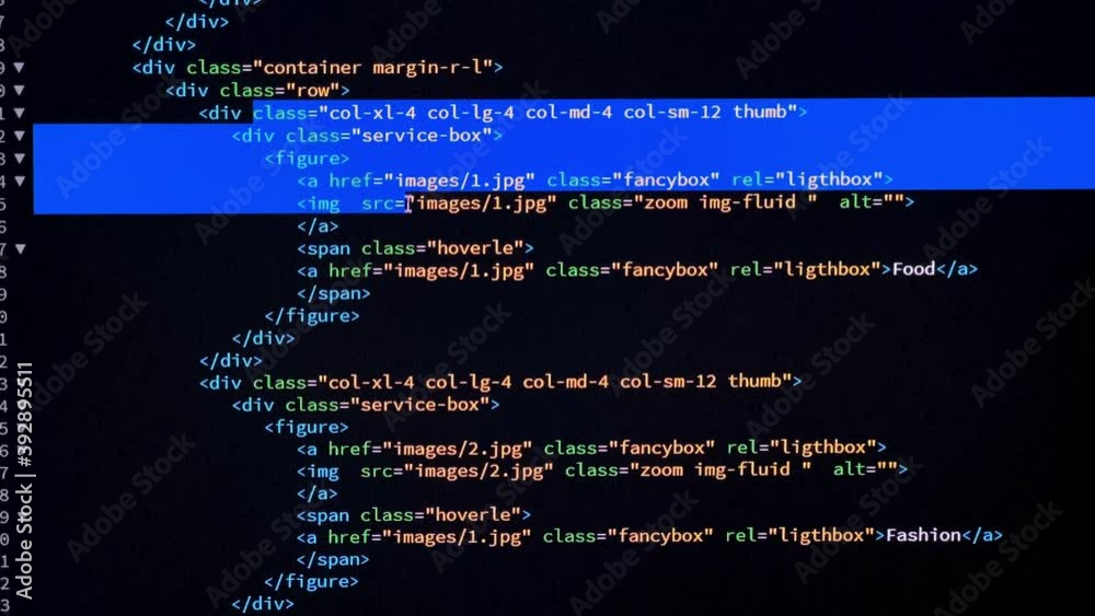 Developer Is Browsing And Marking Html Code On The Computer Screen developer-is-browsing-and-marking-html-code-on-the-computer-screen