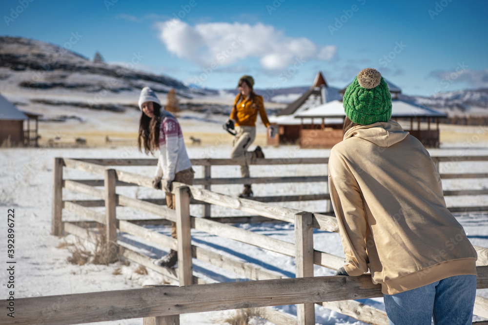 Young girls friends having fun at first snow Young girls friends having fun at first snow