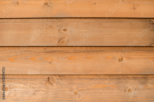 Light wood texture with knots. Wooden horizontal planks background