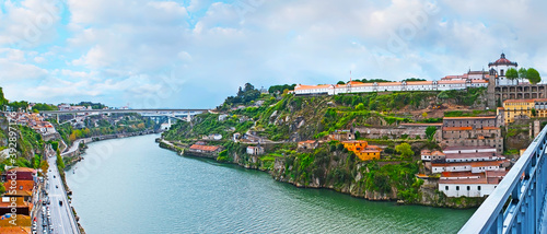 The rocky bank of Vila Nova de Gaia with Serra do Pilar Monastery, Portugal photo