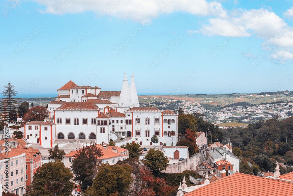Top view of National Palace of Sintra, Portugal, Autumn time, yellow and orange trees