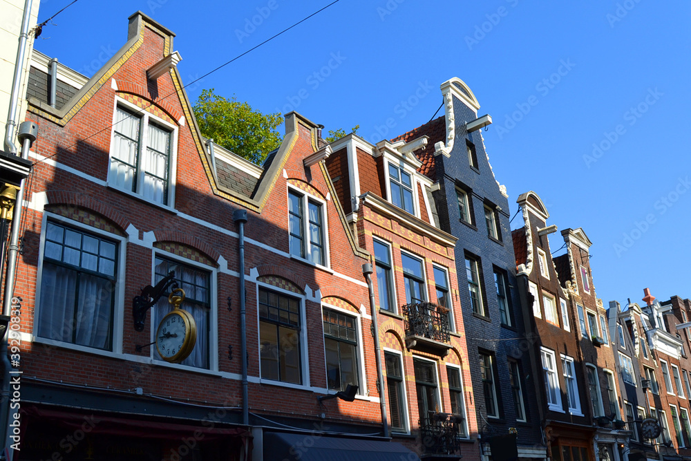 Traditional dutch architecture, facades of houses in Amsterdam, The Netherlands.