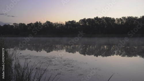 Amazingly beautiful streamy and foggy lake in early hours of a cold morning, Kızılırmak photo