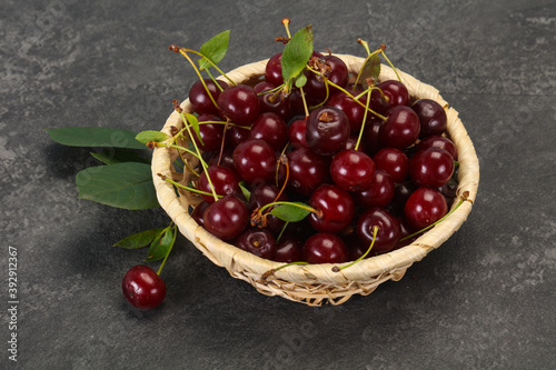 Sweet ripe cherry with leaves