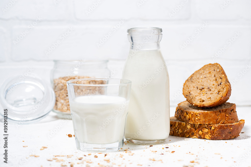 fresh milk and whole grain bread slices fresh milk and whole grain bread slices