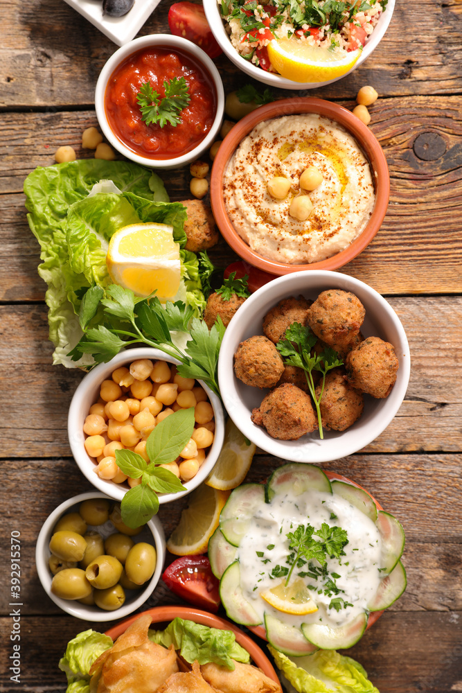 assortment of dish- hummus, falafel, pita bread, chickpea